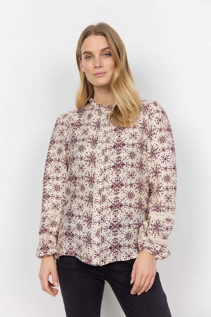 Blouse avec col à volants