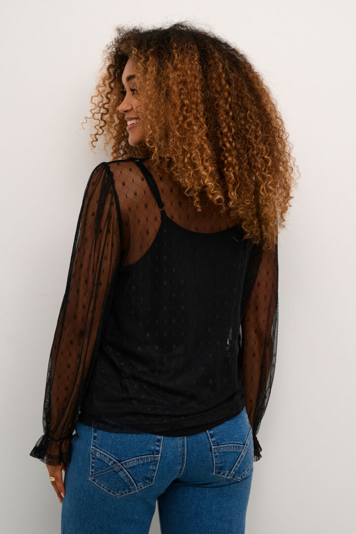 Blouse transparente avec camisole intégrée