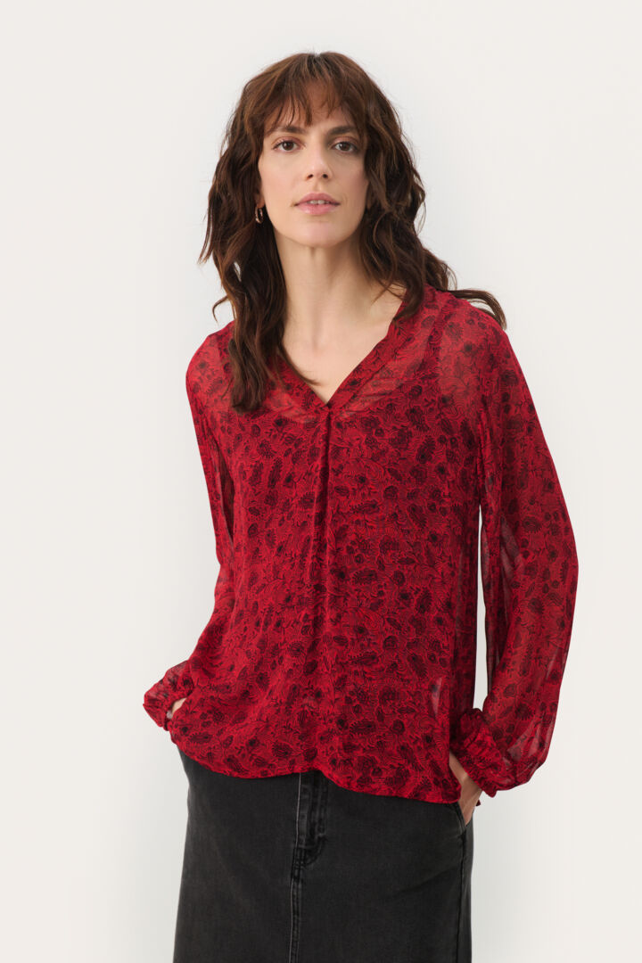 Blouse transparente avec motif de feuilles