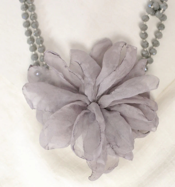 Collier de billes avec fleurs