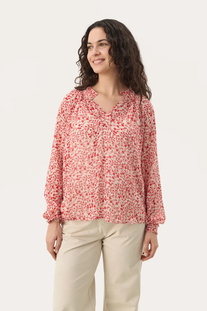 Blouse fluide et voluptueuse à motifs