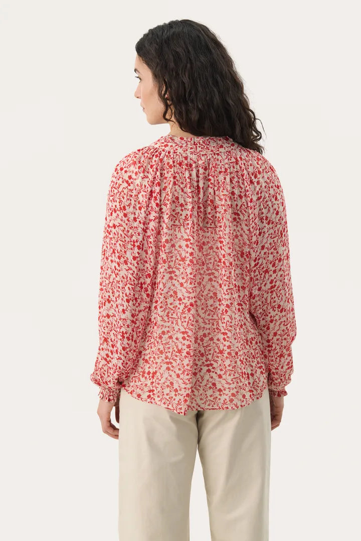 Blouse fluide et voluptueuse à motifs