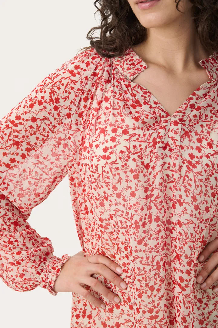 Blouse fluide et voluptueuse à motifs