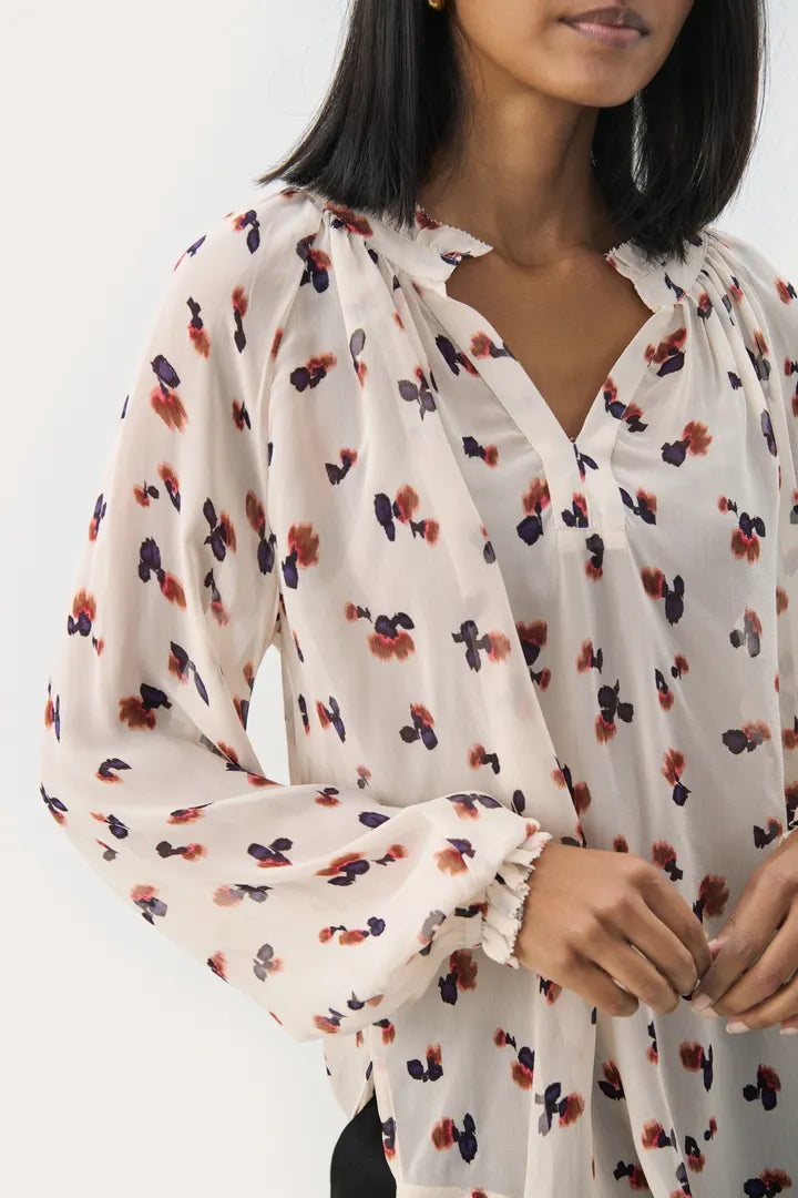 Blouse fluide et voluptueuse à motifs